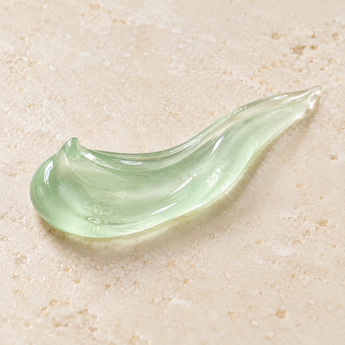 Textura de gel verde transparente sobre piedra clara